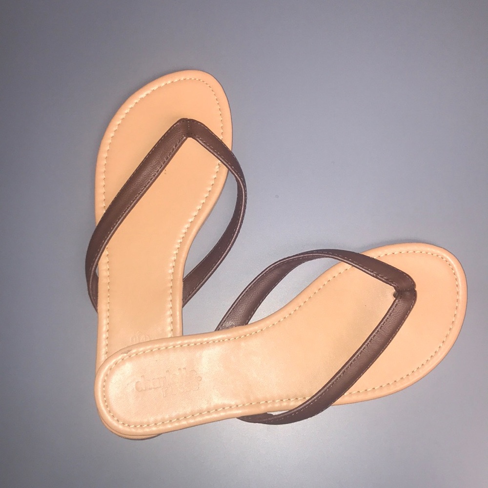Brown flip flops